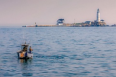 Fishing Near Boston Harbor Lighthouse in Early Morning